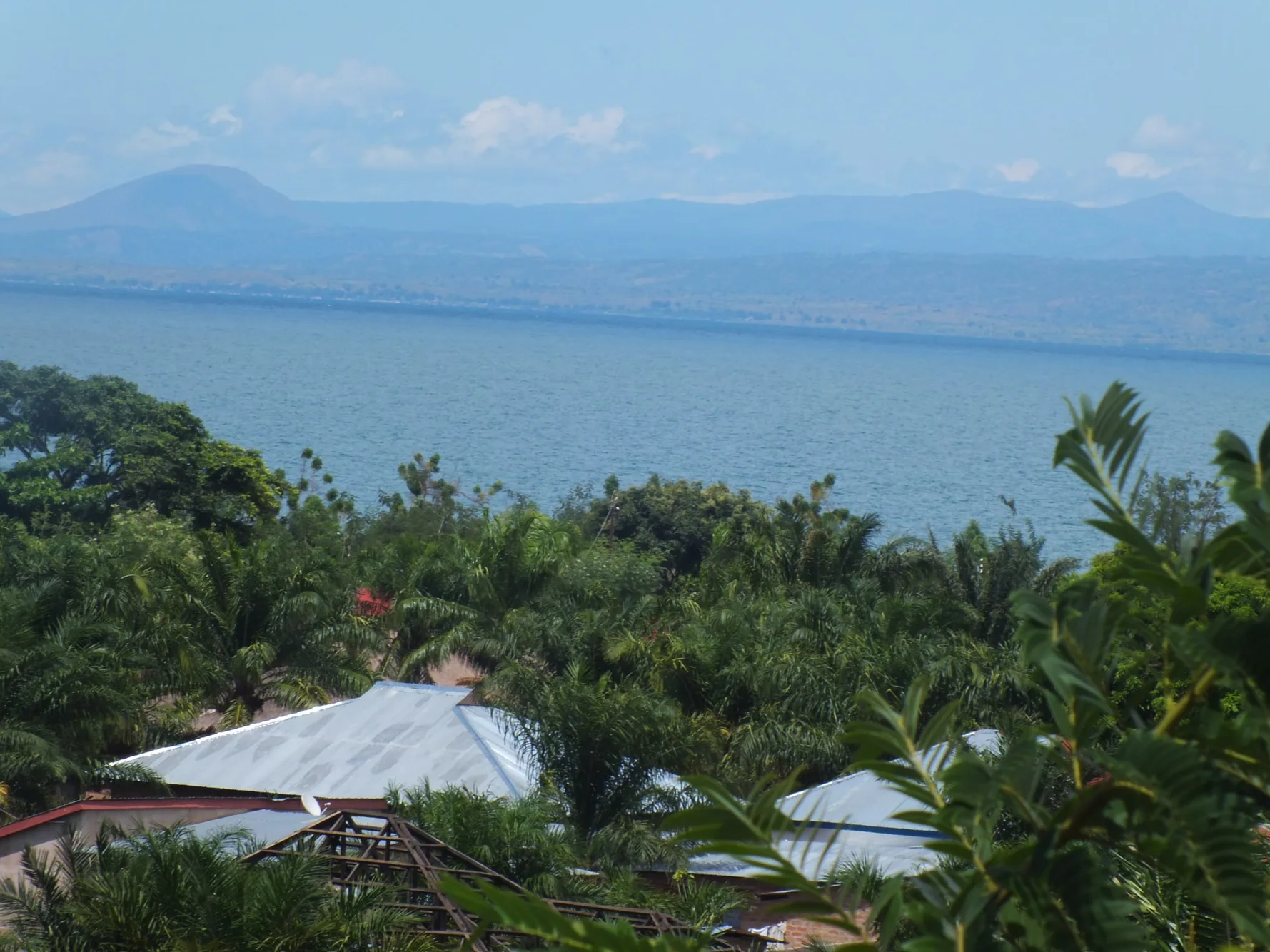 On a hilltop in Congo, observing across to see the Tanzania side of the rift lake.