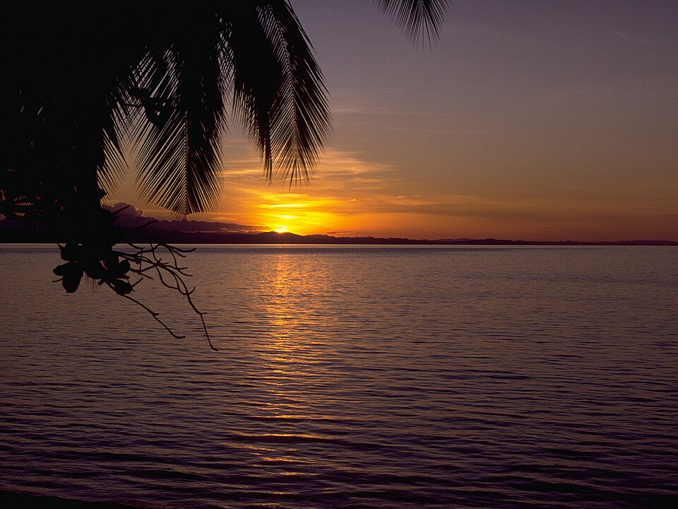 Sun setting over Lake Malawi at Cape Macclear, Malawi.