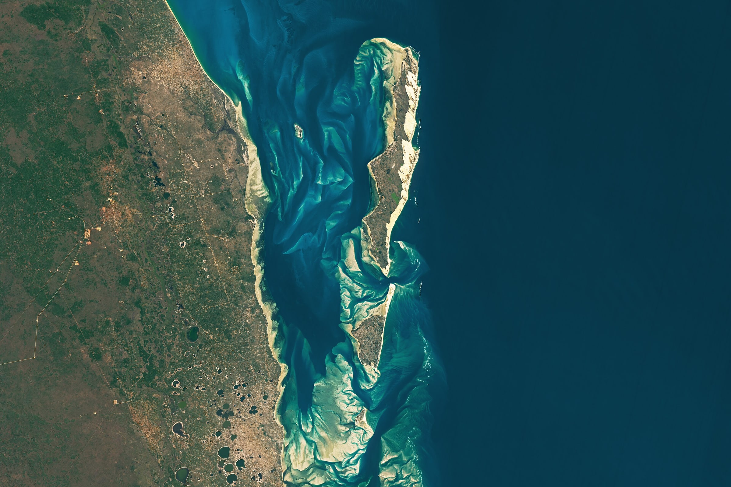 Today’s story is the answer to the June 2025 puzzler. Off the coast of East Africa, the Bazaruto Archipelago extends like a thumb into the western Indian Ocean. The surrounding wat