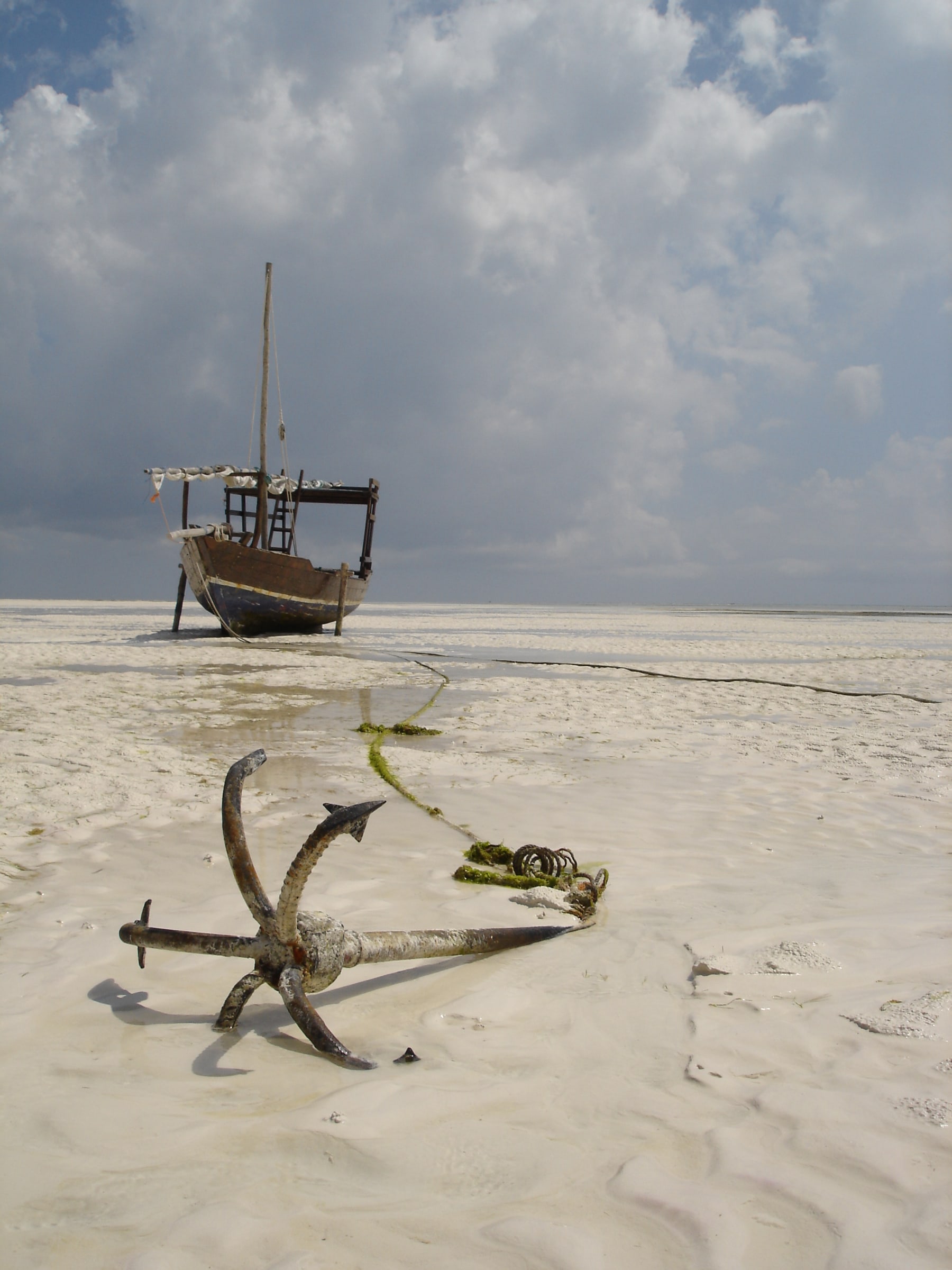 Dhow and Anchor on the Beach, East Coast of Zanzibar, Tanzania