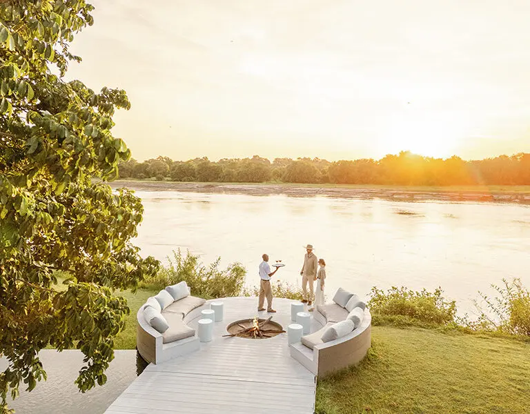 TimeTide Chinzombo Zambia South Luangwa sundowners at firepit