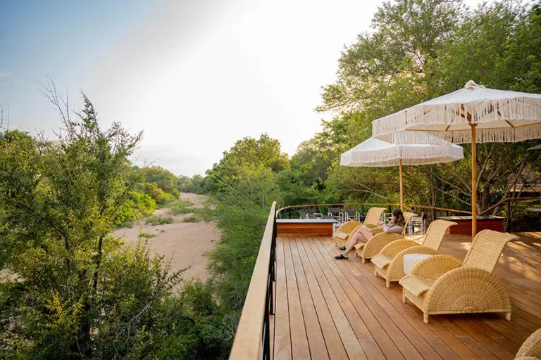 Thornybush Game Lodge Deck seating overlooking riverbed