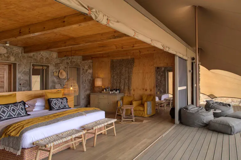 Wetu namiri plains namiri plains family tent rooms deck1
