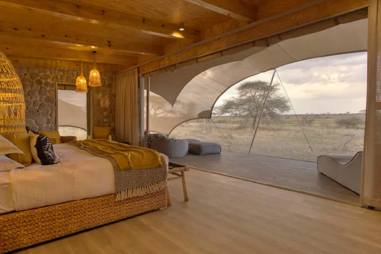Wetu namiri plains tent interior looking out onto the plains