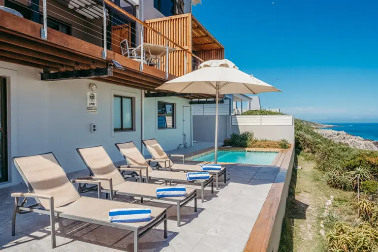 Cliff Lodge Hermanus Pool deck from the sea side scaled 2