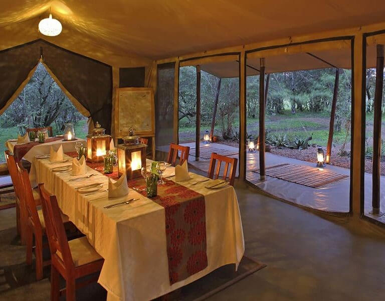 Asilia Africa Encounter Mara Dining room at sundown