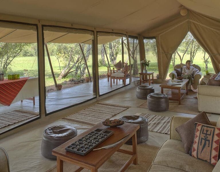 Asilia Africa Encounter Mara Guest lounge and patio