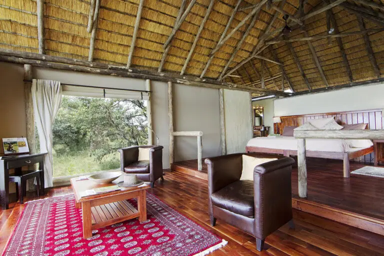 KwandoLagoonCamp UpperLevelBedroom Lounge