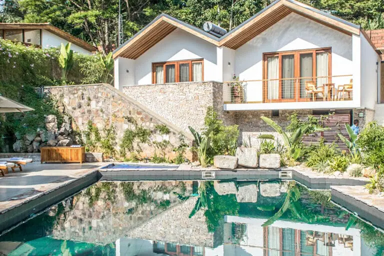 The Retreat Salt Water pool hot tub and diving rocks