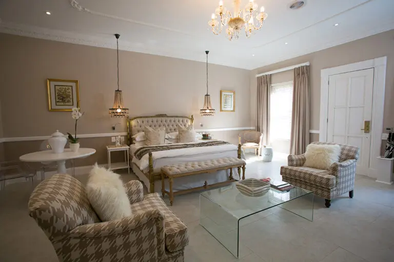 FairlawnsBoutiqueHotelSpa UpperLevelBedroom LuxuryRoom1
