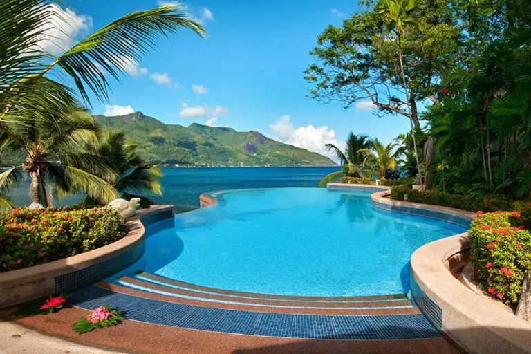 Hilton Seychelles Northolme Resort Infinity Pool by Day scaled 1