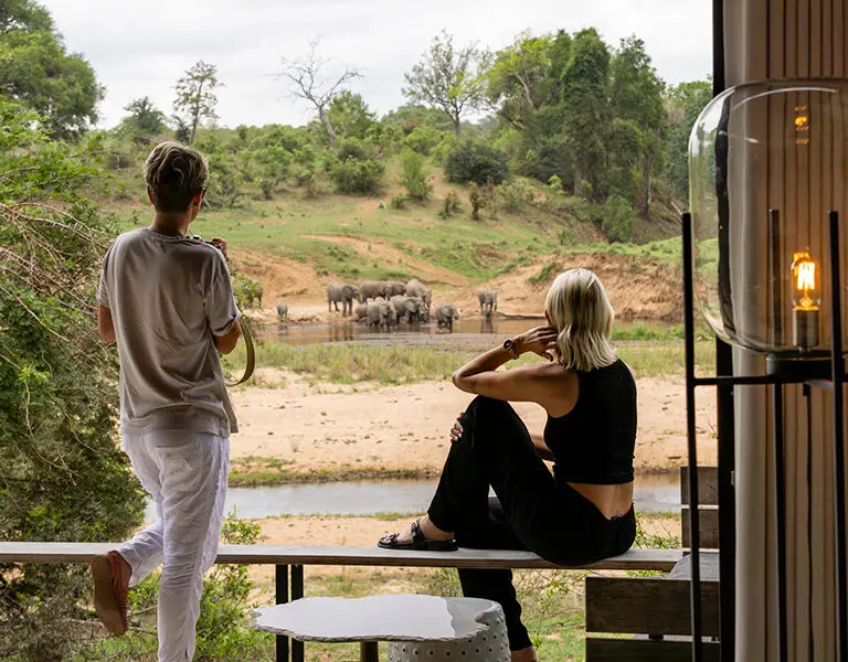 Lion Sands Ivory Lodge River Suite view couple