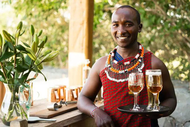 Naboisho Camp Waiter serving drinks