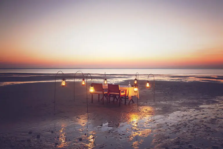 Azura benguerra dining on beach 2