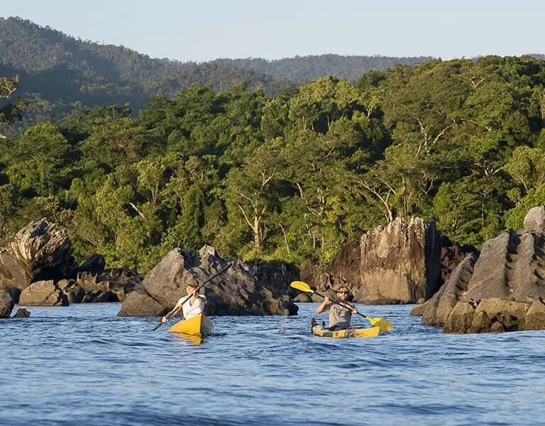 Kayaks among the rocks below the Masoala forest