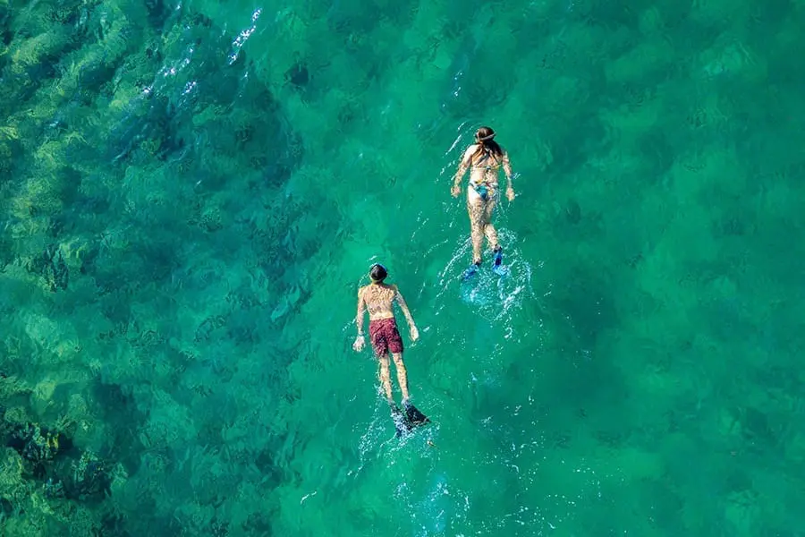 Two people snorkelling in clear water off the Masoala coast