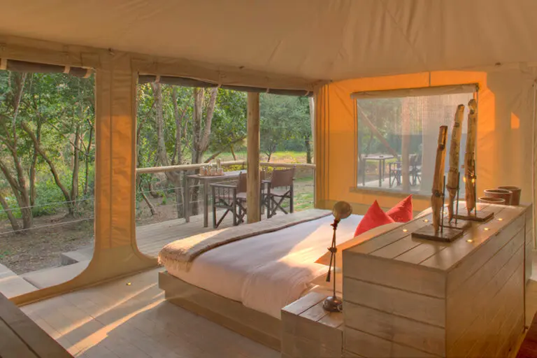 KichwaTemboTentedCamp UpperLevelBedroom LuxuryRoom