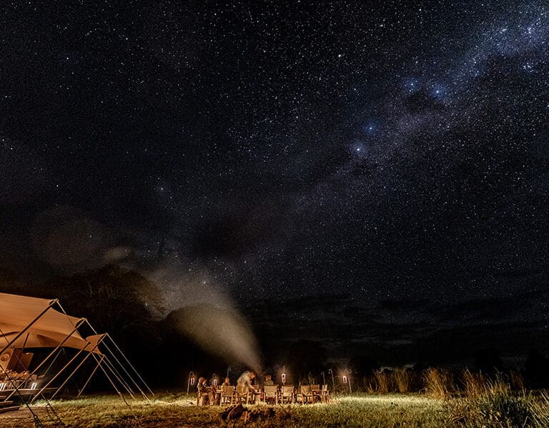 GORONGOSA SAFARIS Chicari Camp Main Area Fire pit under stars 32