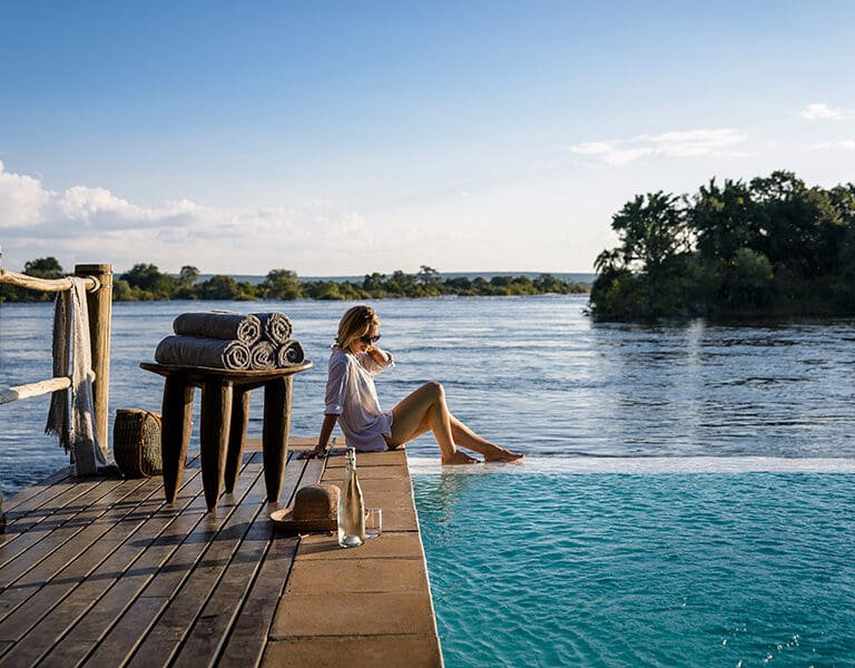 Sussi Chuma an AK Sanctuary Victoria Falls Zambia pool deck