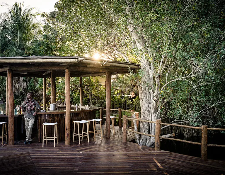 Sussi Chuma an AK Sanctuary Victoria Falls Zambia deck bar