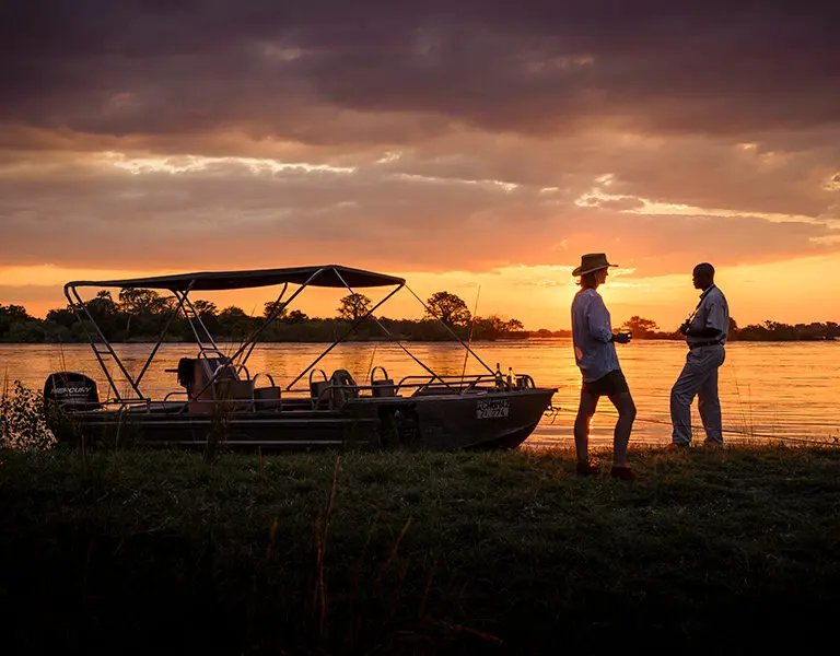 Sussi Chuma an AK Sanctuary Victoria Falls Zambia boat trip sundowners