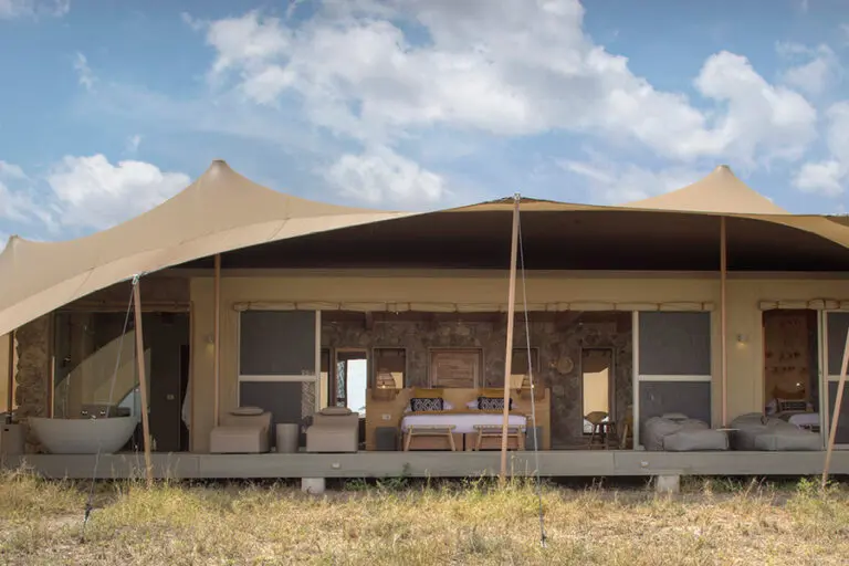 Wetu namiri plains family tent exterior1