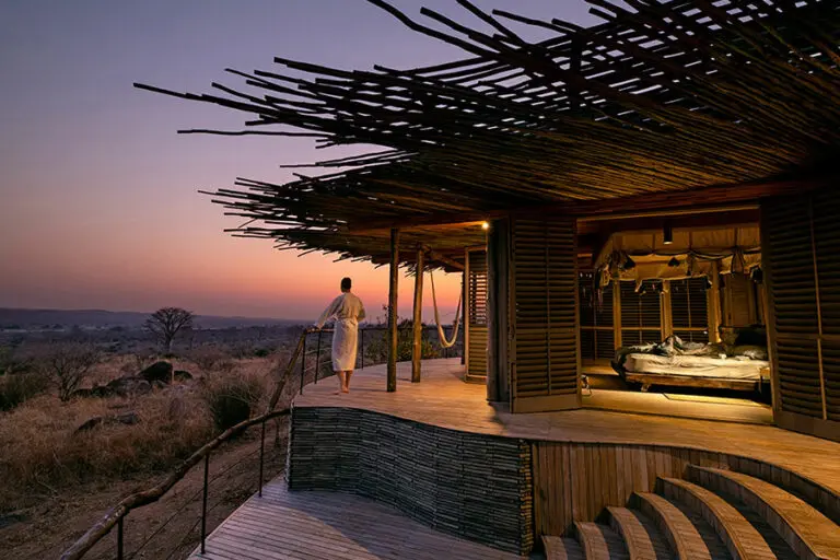 Edited jabali ridge guest taking in sunset over ruaha national park befor bedtime