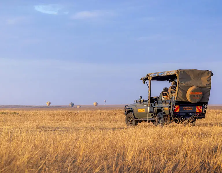 Emboo Camp Kenya Masai Mara SunriseLandcruiserWithBalloons 2