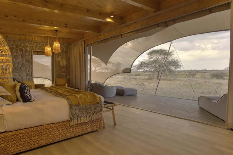 Namiri Plains Tent interior looking out onto the plains 1