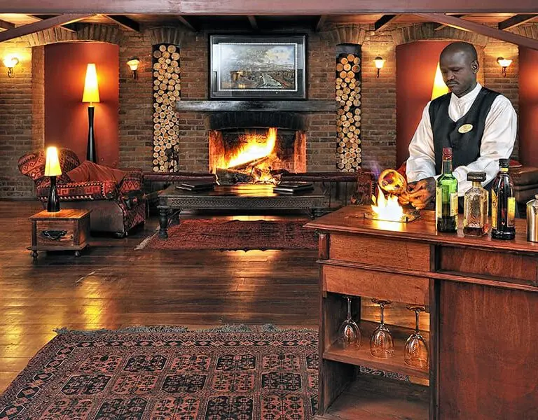 Elewana Arusha Coffee Lodge 3 lounge and bar area
