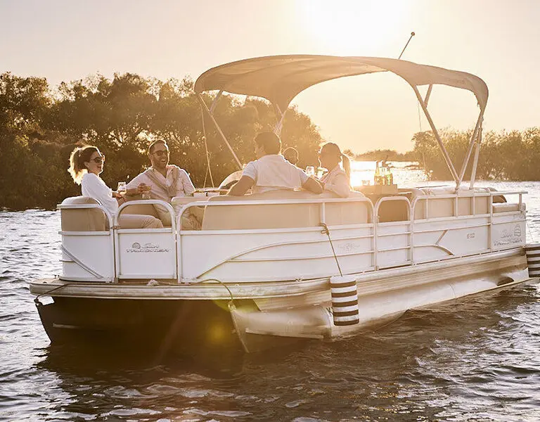 Victoria Falls River Lodge Island Treehouse Suites boat