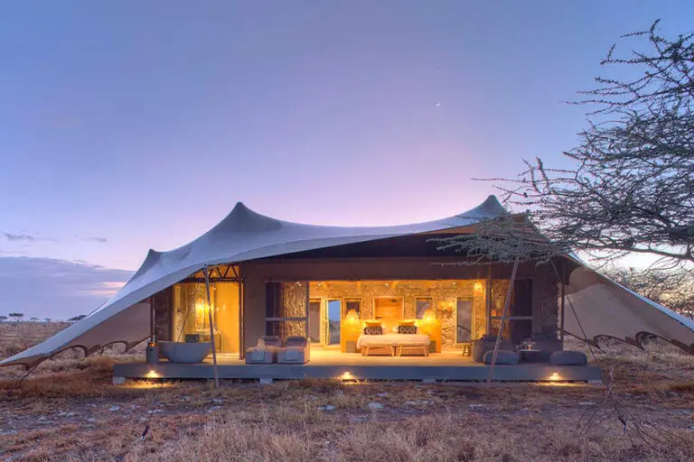 Wetu namiri plains tent exterior at dawn 3